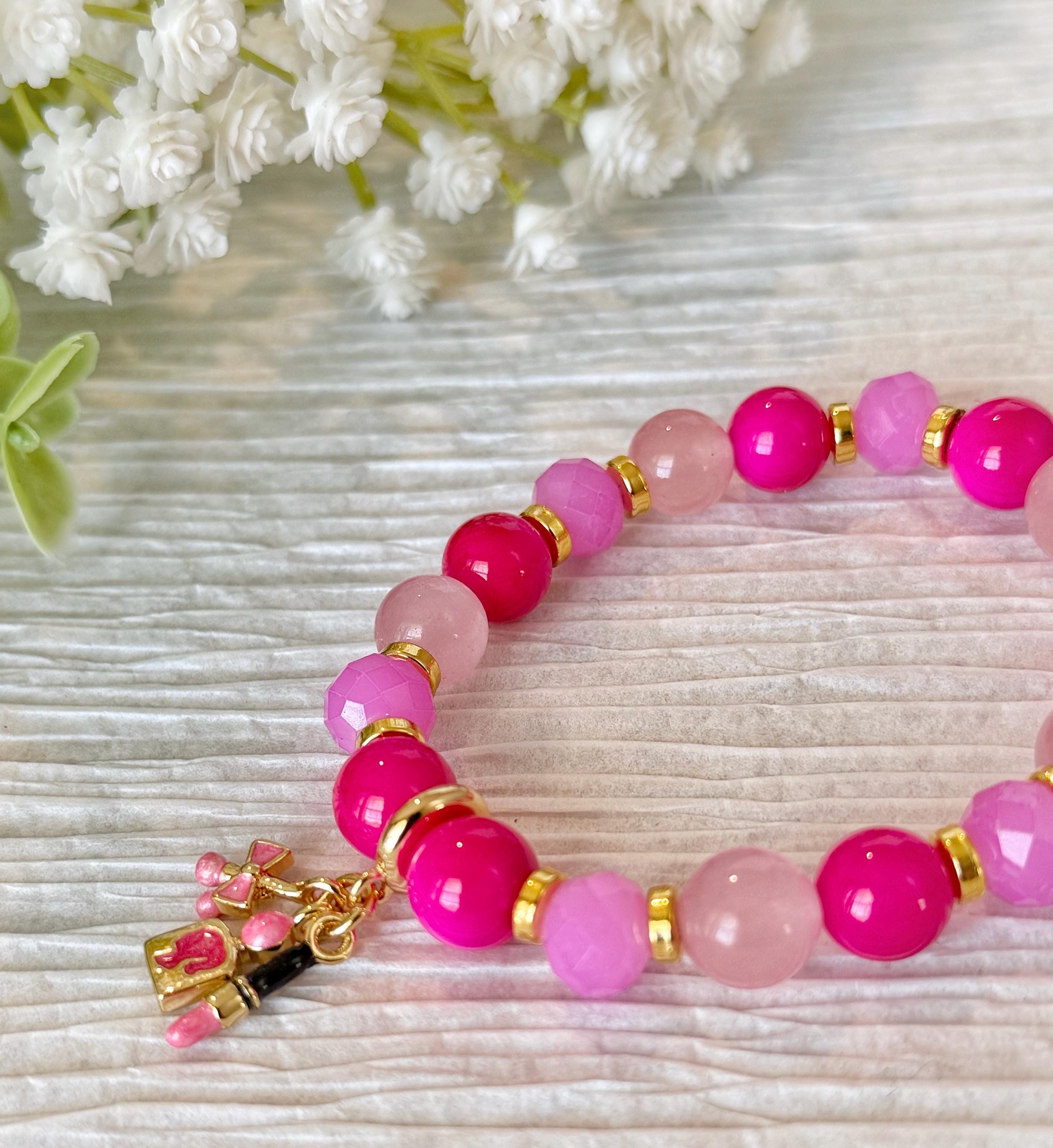 Pink Beaded Bracelet with Doll, Lipstick, Bow Charms, Rose Quartz (7.25in)